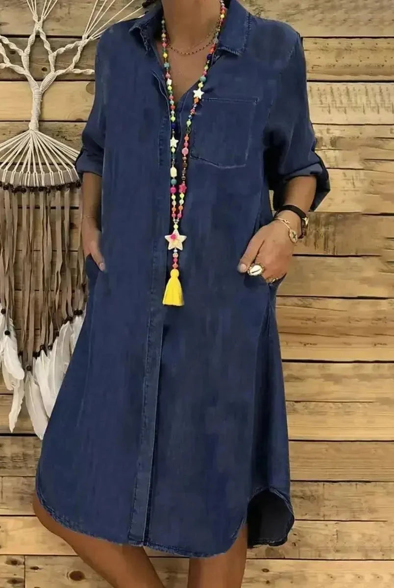 Baby blue Lumina Wear Palmira denim long-sleeved dress shown on a model, featuring a stylish and casual design.