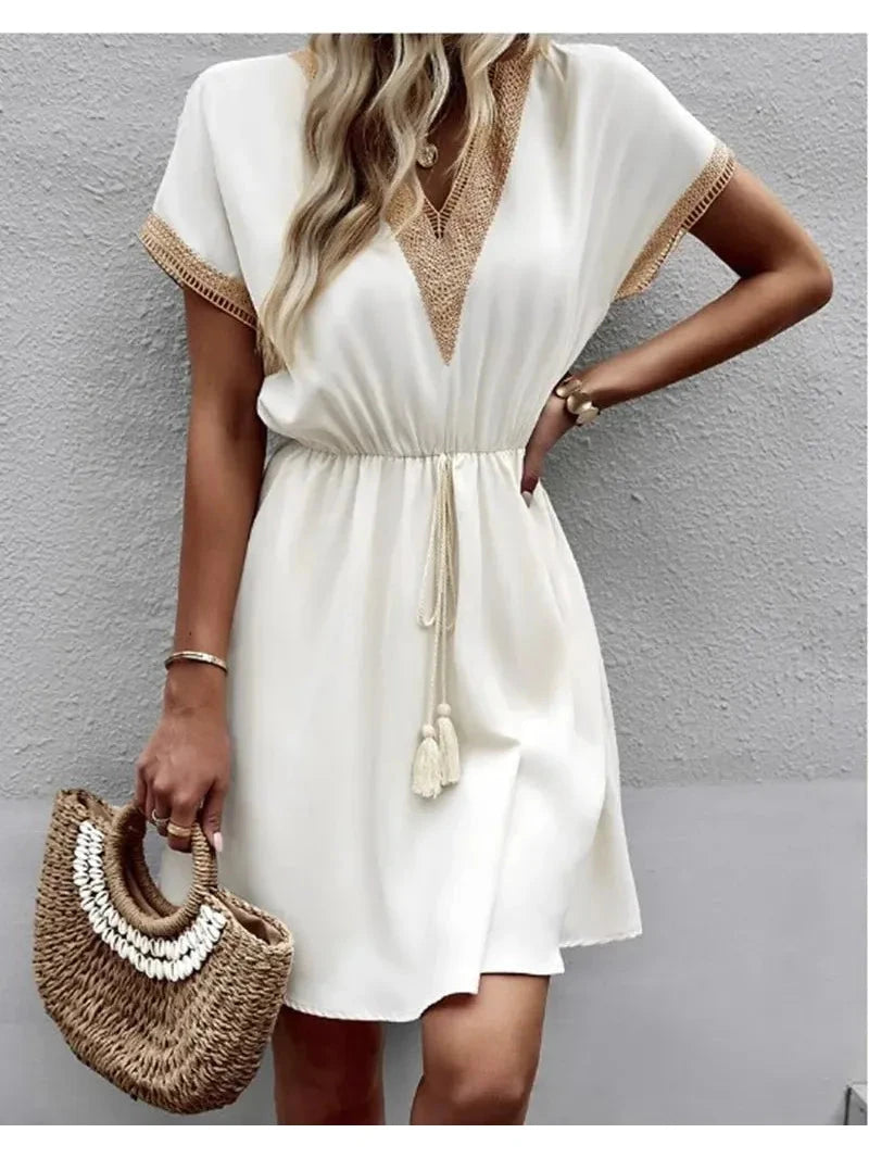 White Paula™ bohemian dress by Lumina Vancouver, featuring flowing fabric and stylish design, perfect for casual or boho-inspired looks.