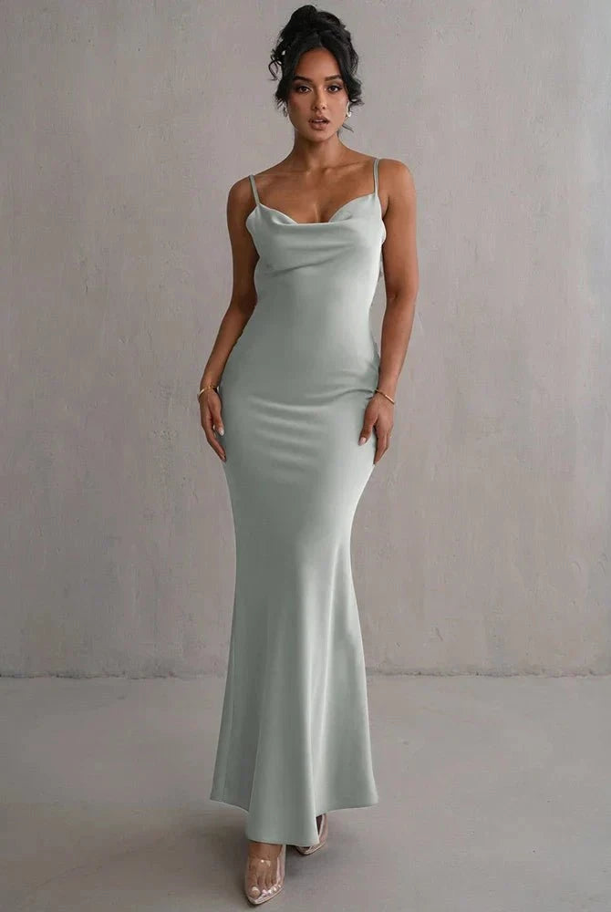 Light green Pauline backless maxi dress by Lumina Wear, elegant and sultry with flowing fabric and a stylish open back design.