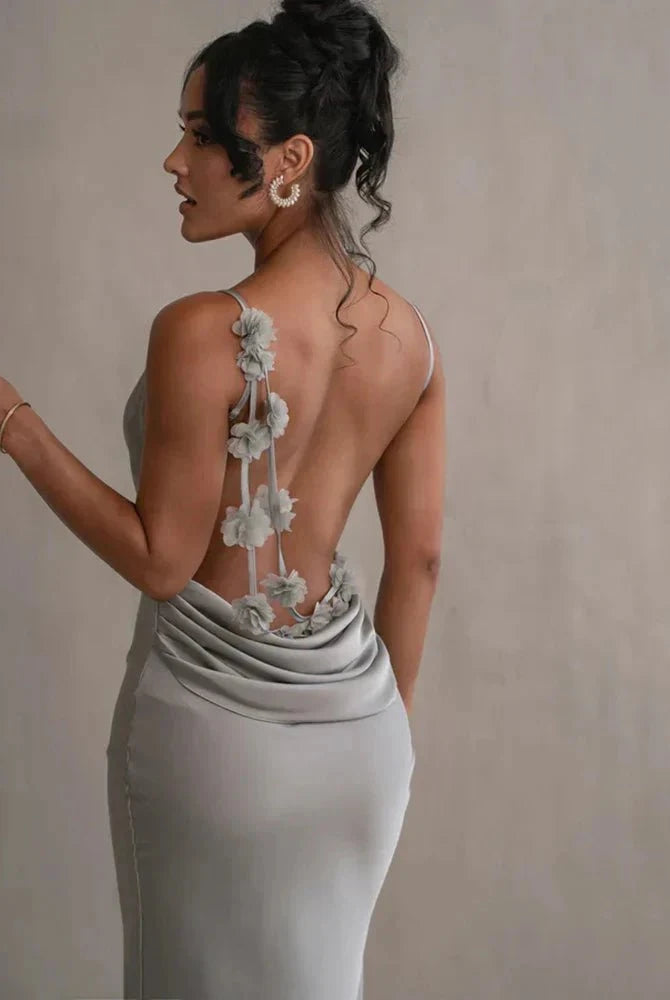 Light green Pauline elegant backless maxi dress by Lumina Wear, showcasing a flowing silhouette and sultry design.