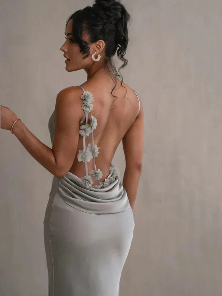 Light green Pauline elegant backless maxi dress by Lumina Vancouver, featuring a sultry, flowing design perfect for formal occasions.