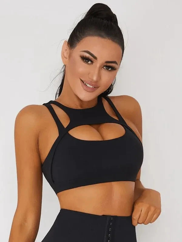Black Peatacle Sports Bra from Lumina Vancouver featuring supportive, breathable fabric for active wear and athletic workouts.