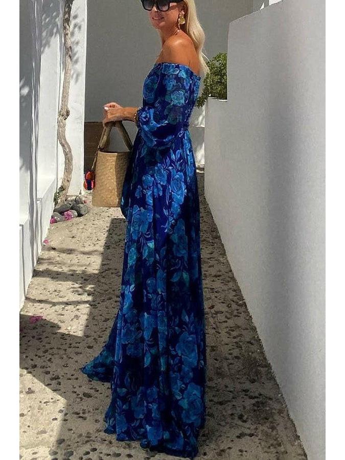 Blue Penelope floral off-shoulder maxi dress by Lumina Vancouver, featuring a flowing design and elegant floral pattern.