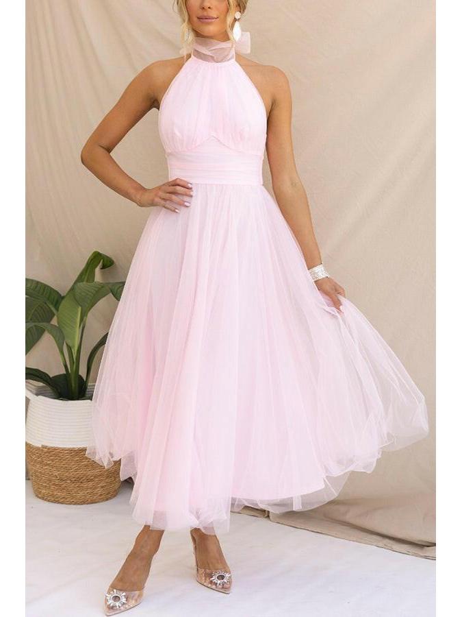 Dark pink Phoebe fancy tulle dress by Lumina Vancouver, perfect for wedding guests, shown on a size 8-10 model.