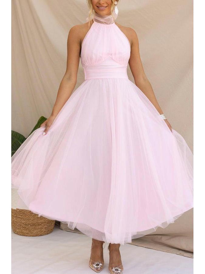 Dark pink Phoebe fancy tulle dress by Lumina Vancouver, perfect for wedding guests, with elegant tulle fabric and stylish design.