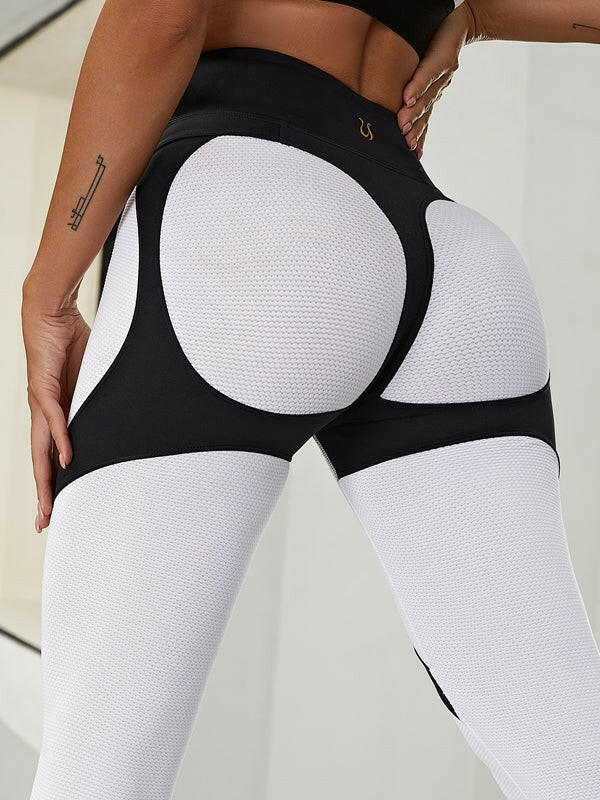 Black Lumina Vancouver PU fishnet breathable sports bra showing its mesh design and supportive fit for active wear.