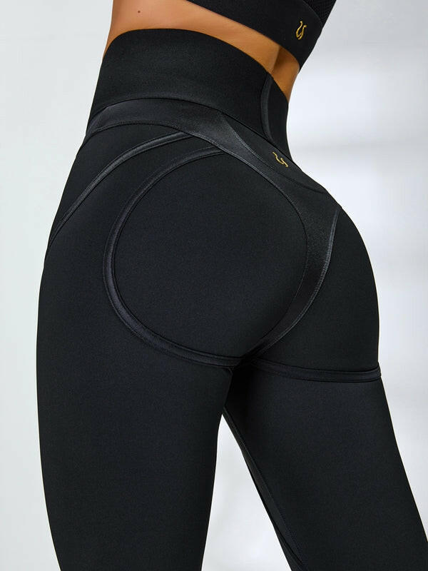 Black PU fishnet breathable sports bra by Lumina Vancouver, designed for support and style during workouts.