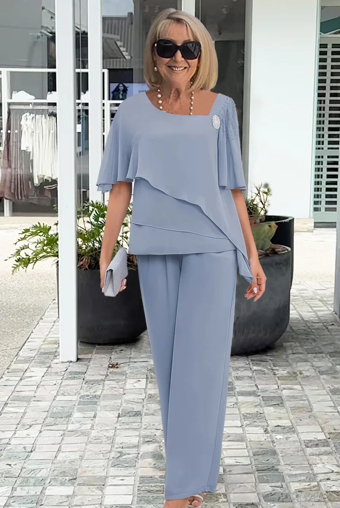 Light blue women's floral print two-piece set by Lumina Wear, featuring flattering silhouettes and elegant design for women.