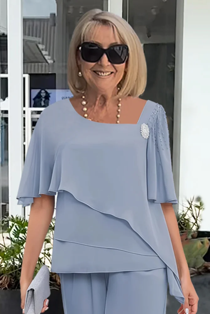 Light blue women's floral print two-piece set by Lumina Wear, featuring elegant style and flattering silhouettes.