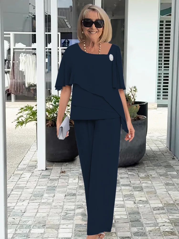 Light blue women's floral print two-piece set by Lumina Wear featuring elegant, flattering silhouettes for a sophisticated look.