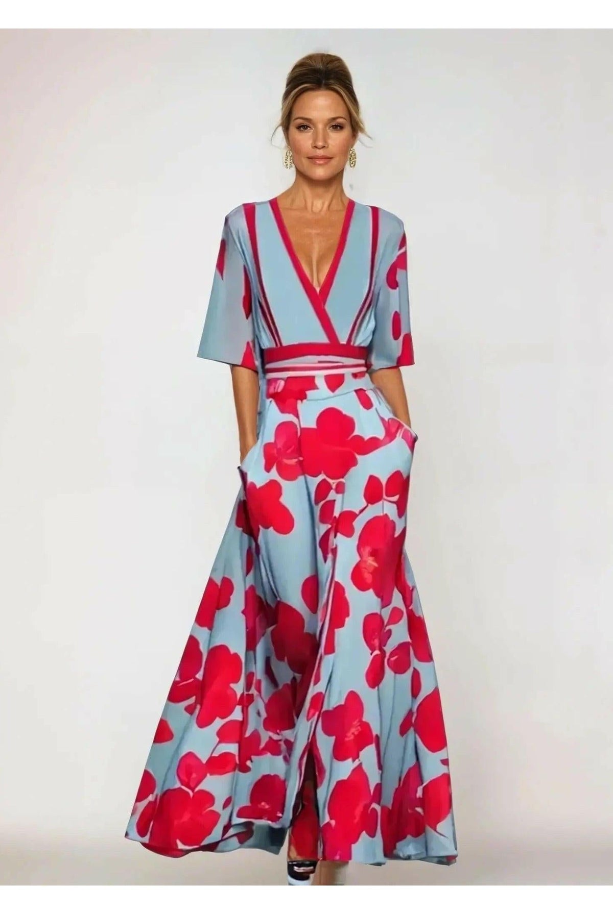Red floral maxi dress by Lumina Wear featuring a flowing silhouette and vibrant floral pattern, perfect for summer or special occasions.