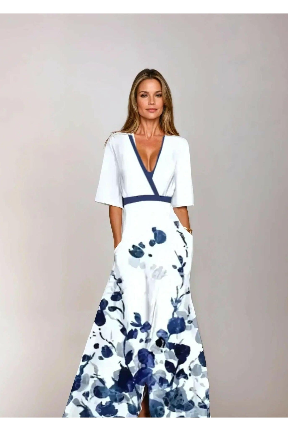 Red Rachel floral maxi dress by Lumina Wear, flowing fabric and vibrant floral pattern, perfect for summer occasions.