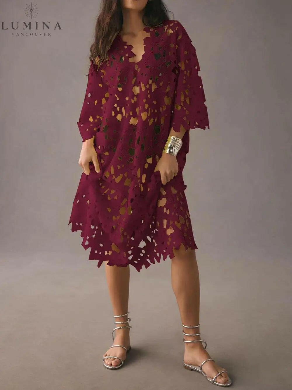 White floral eyelet long sleeve midi dress from Lumina Vancouver's Summer Dress Collection, featuring a feminine, lightweight design.