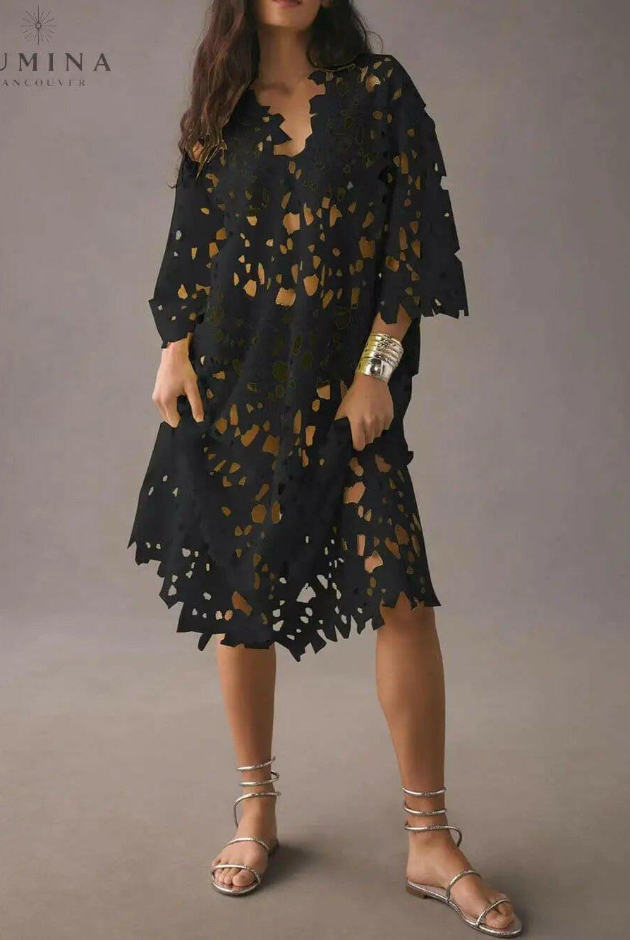 White Raquel floral eyelet long sleeve midi dress from Lumina Vancouver's summer dress collection, featuring a flowy, feminine design.