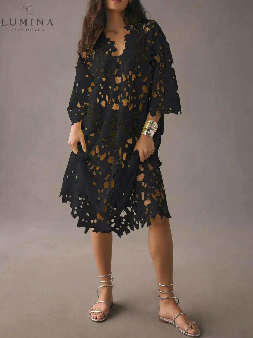 White Raquel floral eyelet long sleeve midi dress from Lumina Vancouver's summer dress collection, featuring a flowy, feminine design.