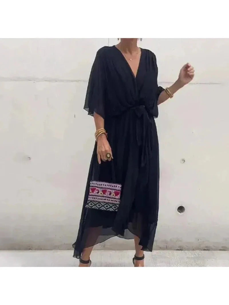 Black Remi elegant loose dress by Lumina Wear, shown in size S, featuring a flowing, relaxed fit and stylish design.