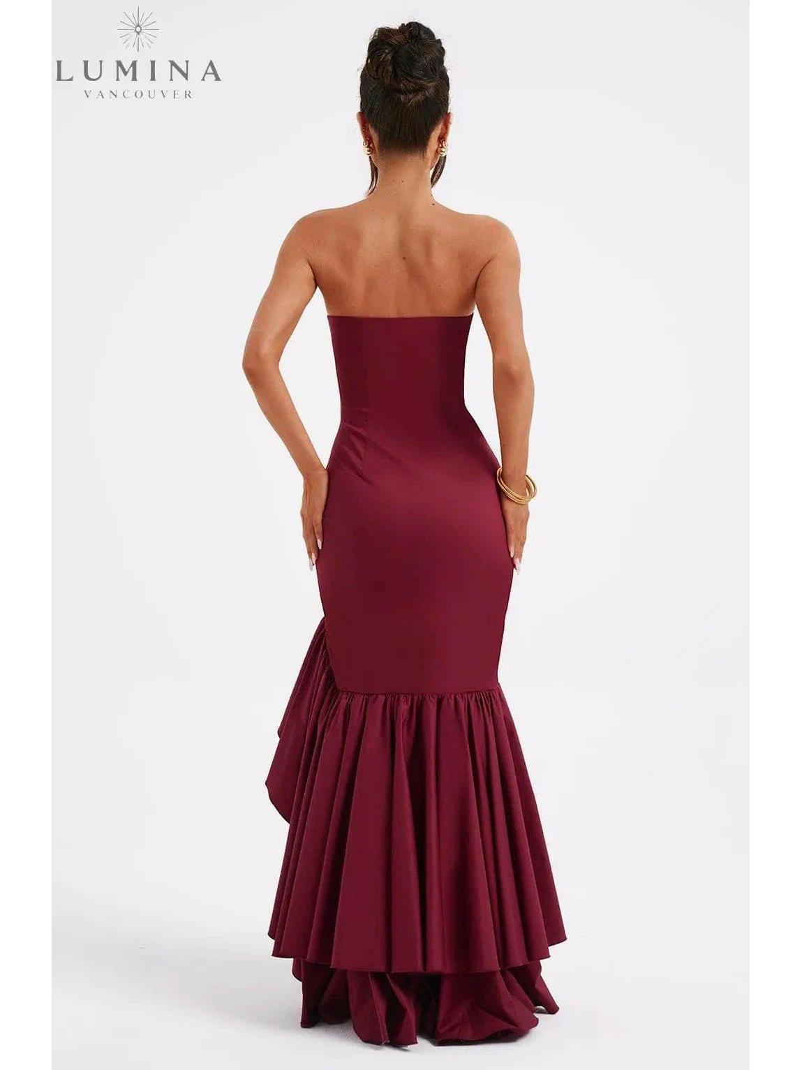 Blue floral Riviera sleeveless slit ruffle maxi dress by Lumina Wear, perfect for wedding guests, shown with elegant ruffle details.