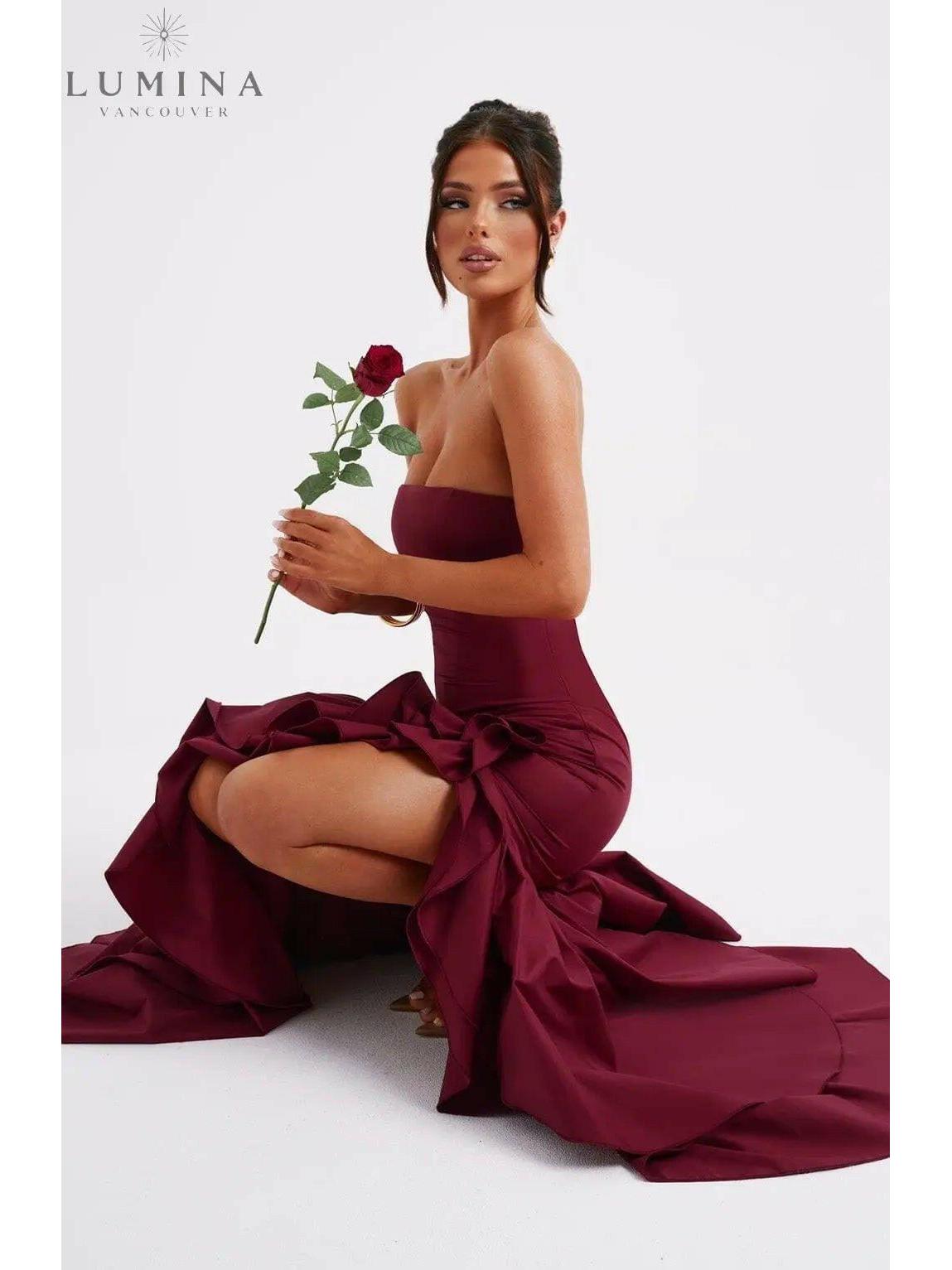 Blue floral sleeveless Riviera slip ruffle maxi dress by Lumina Wear, perfect for wedding guests, shown on a model.