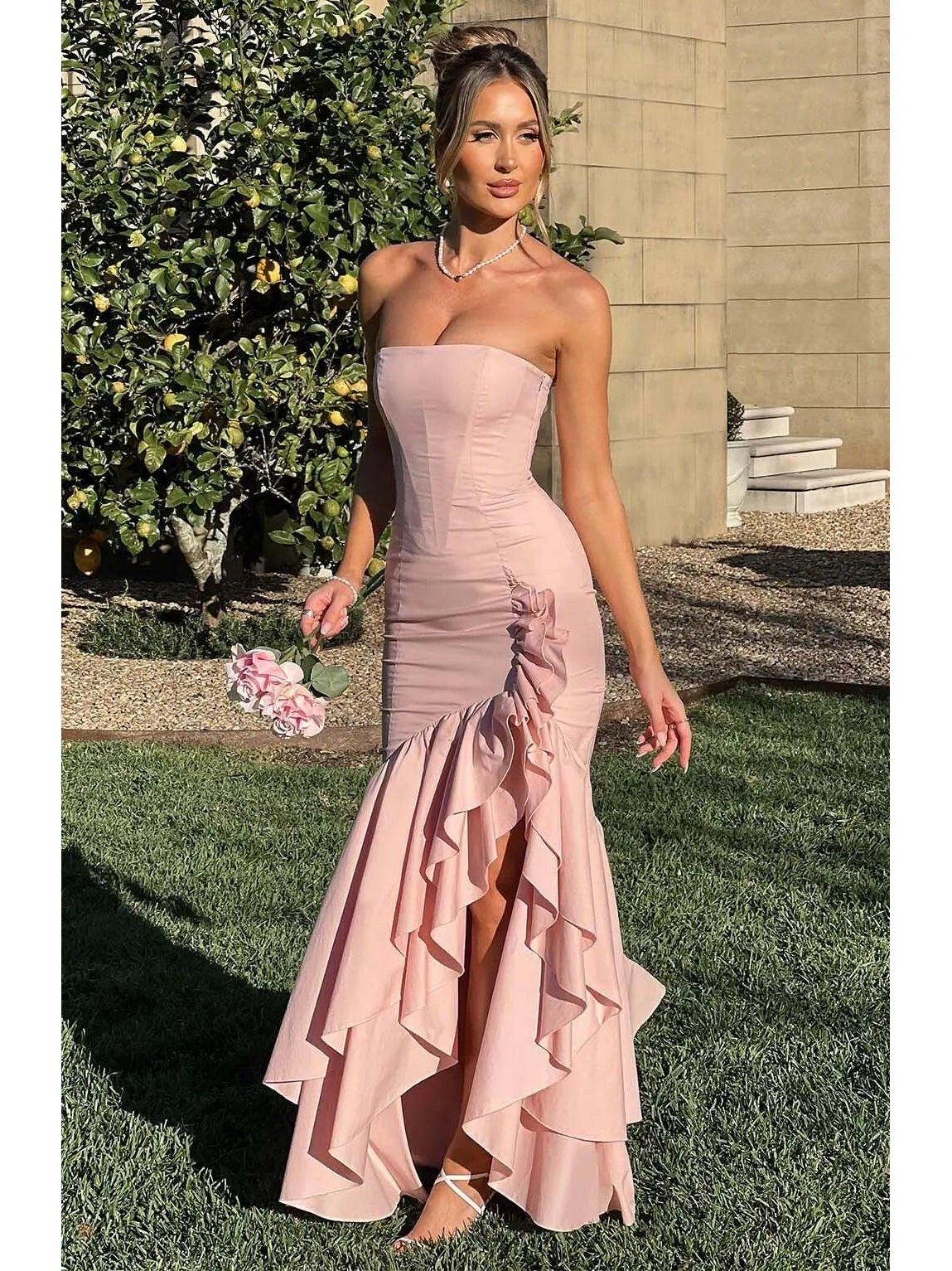 Blue floral sleeveless slit ruffle maxi dress by Lumina Wear, perfect for wedding guests, shown with flowing fabric and elegant design.