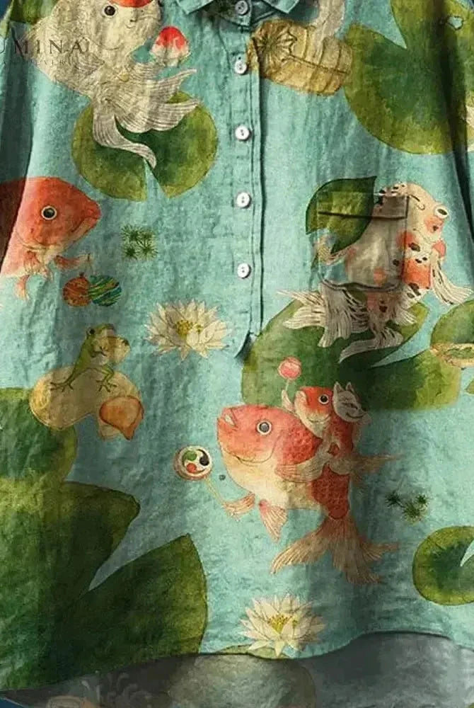 Green Rosa Fish Print T-Shirt by Lumina Wear featuring a vibrant fish graphic on a casual tee.