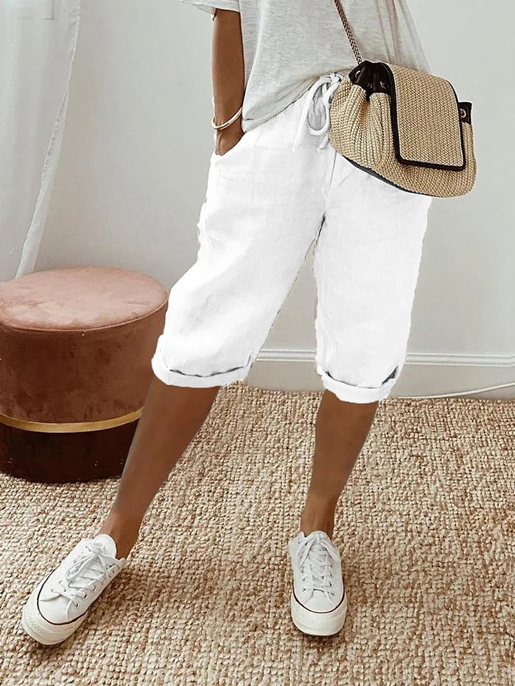 Beige linen blend shorts with adjustable waistband from Lumina Wear, featuring a relaxed fit and casual style.