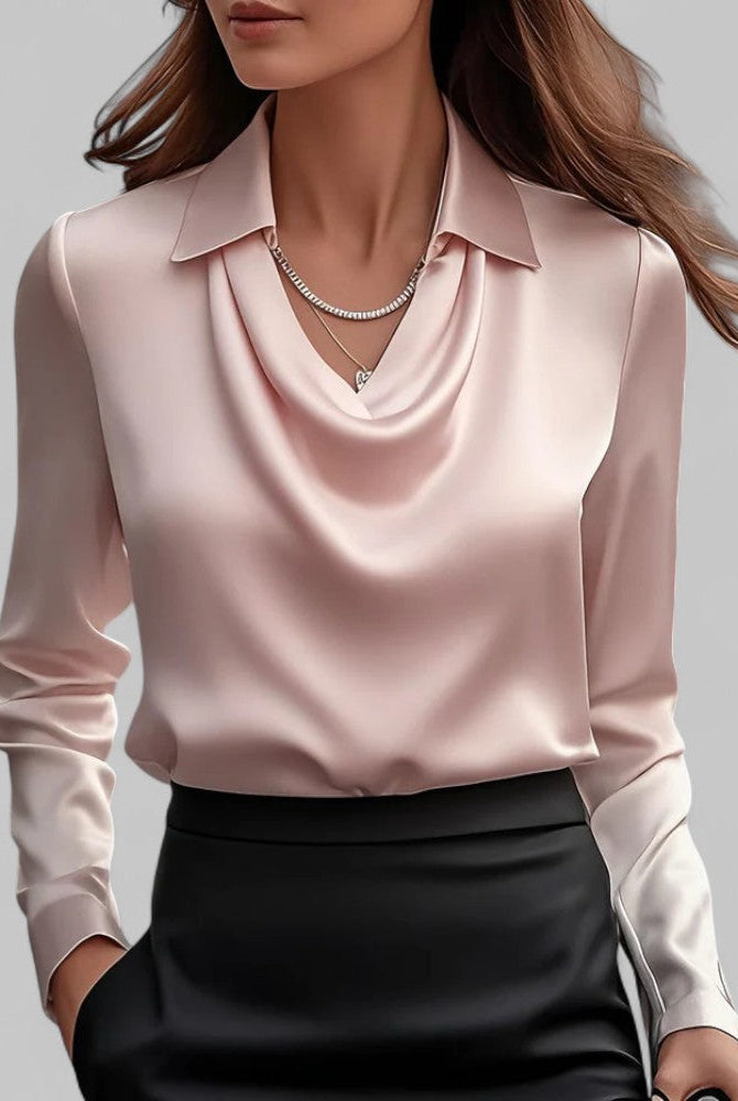 White women's blouse by Lumina Wear featuring an elegant draped neckline and long sleeves, perfect for sophisticated style.