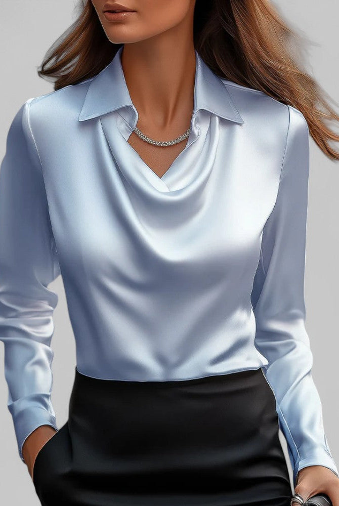 White women's blouse with elegant draped neck and long sleeves by Lumina Wear, featuring a soft rose-colored fabric and stylish fit.