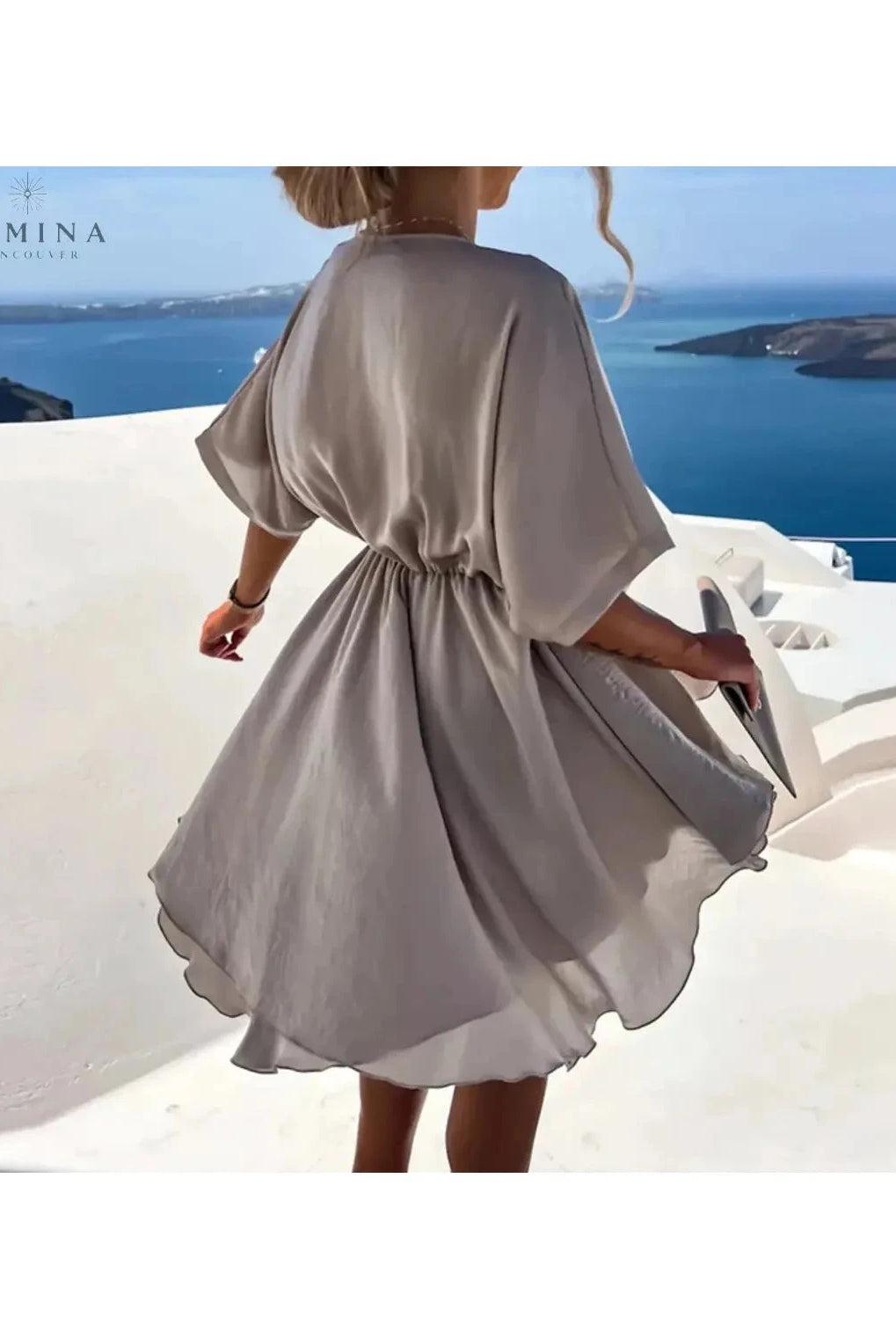 Pink rose-colored elegant evening dress by Lumina Wear, featuring a flowy design perfect for wedding guest attire.