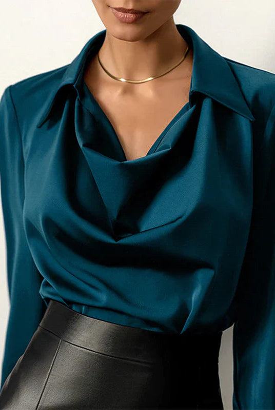 Elegant bronze Samantha blouse by Lumina Wear featuring a draped neckline and long sleeves, designed for sophisticated style.