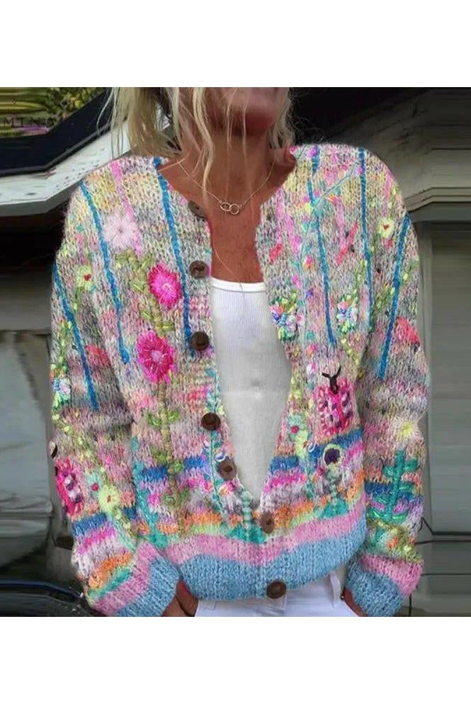 Blue Sanne elegant cardigan with floral print from Lumina Vancouver, showcasing a stylish and lightweight knit design.