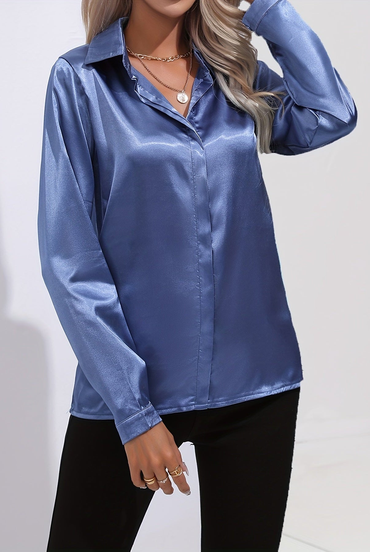 Blue Sarah Lumina Wear elegant button-down blouse with long sleeves, tailored fit, and classic collar, perfect for professional or casual wear.