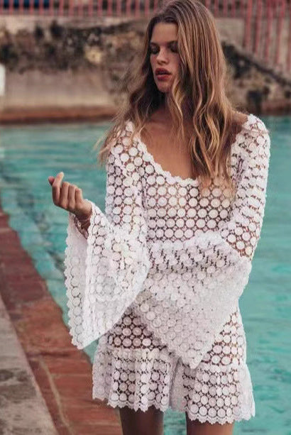 White Seraphina beach cover-up dress by Lumina Vancouver, featuring a stylish mini dress design perfect for beachwear.