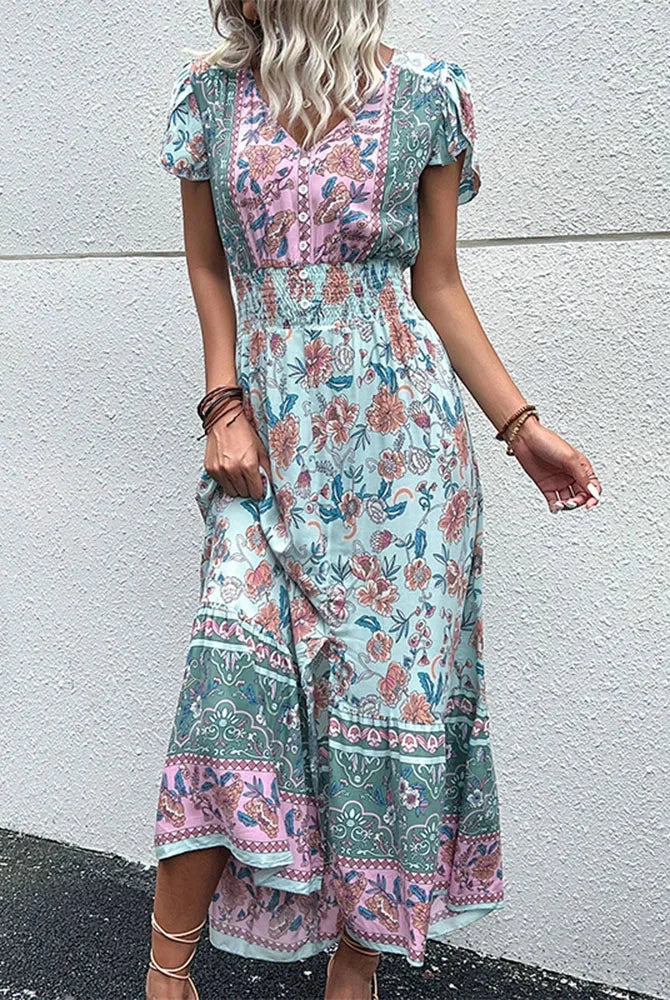 Green Kesa Bloomfield mini dress by Lumina Wear, featuring a stylish midi dress design with a fitted silhouette.