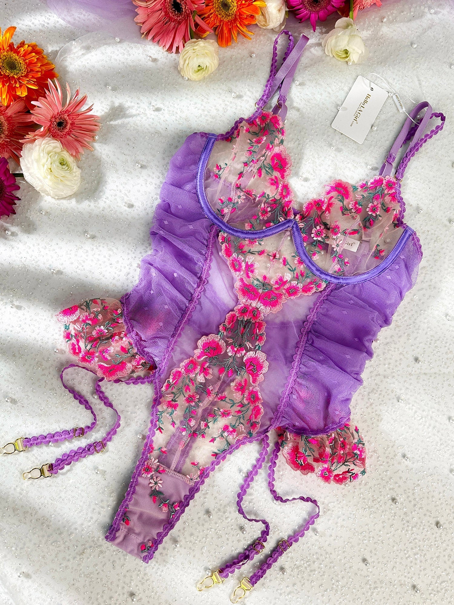 Katri Blossom Frost Lilac Bodysuit by Lumina Vancouver, 1-piece women's bodysuit with floral design and fitted style.