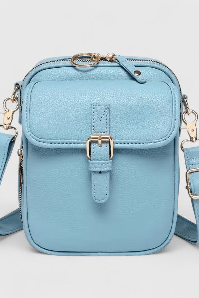 Lumina Wear Seraphina elegant compact crossbody handbag with adjustable strap in brown, showcasing stylish design and craftsmanship.