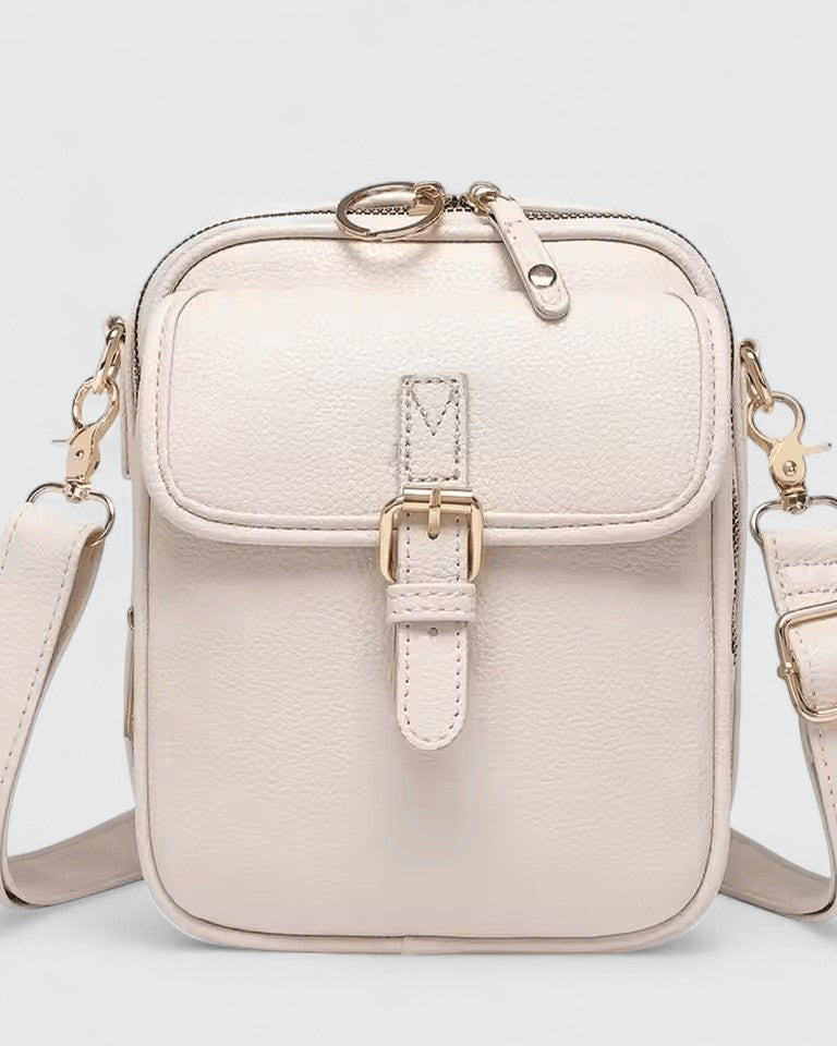 Lumina Wear Seraphina elegant compact crossbody handbag with adjustable strap in brown, featuring a sleek design and stylish finish.