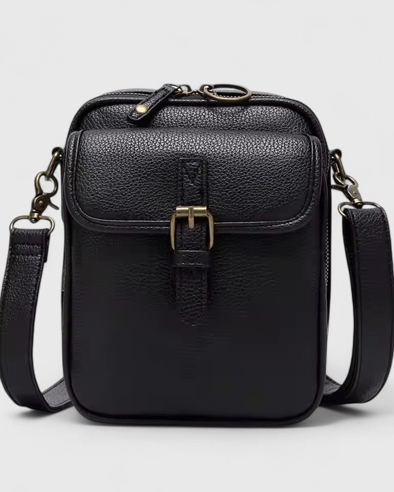 Seraphina Lumina brown compact crossbody handbag with adjustable strap, elegant design, and durable leather material.