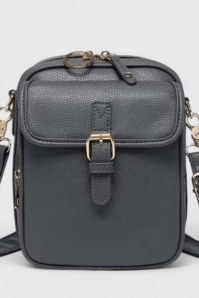 Brown Seraphina Lumina compact crossbody handbag with adjustable strap, stylish and elegant for everyday use.