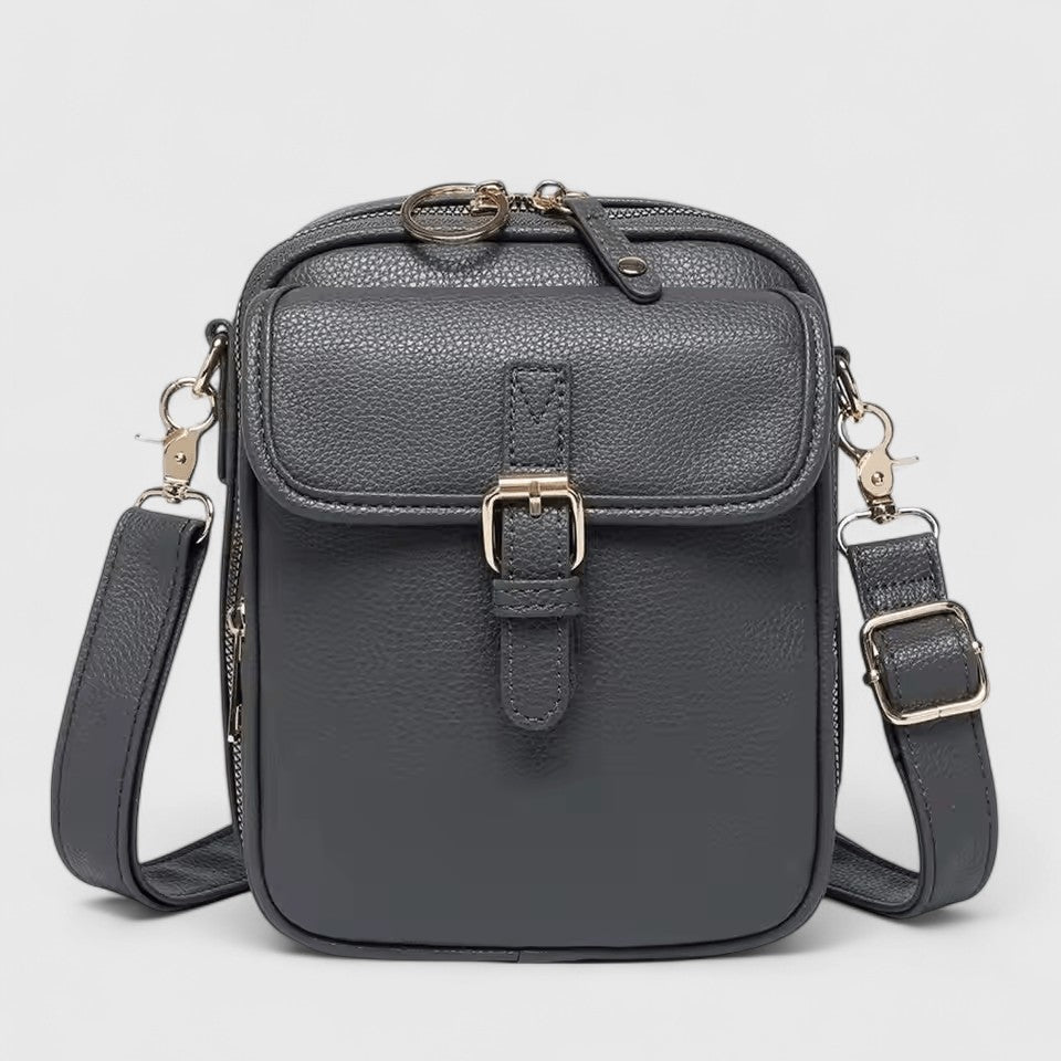 Brown Seraphina Lumina compact crossbody handbag with adjustable strap, stylish and elegant for everyday use.