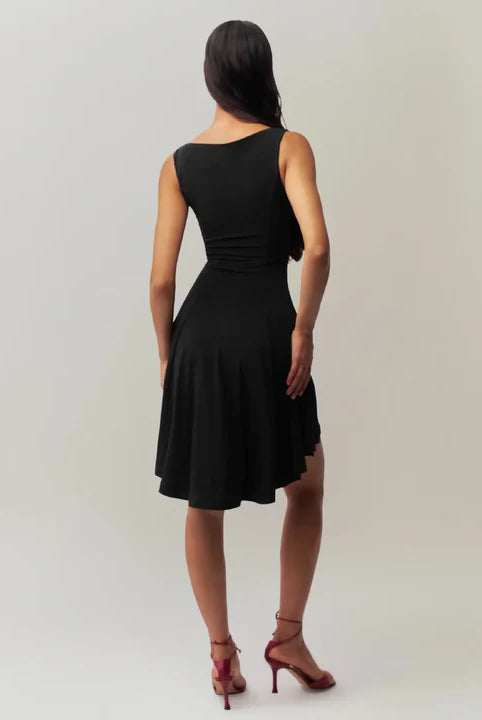 White satin finish mini dress by Lumina Wear, shown on a model, featuring a sleek, elegant design perfect for stylish occasions.
