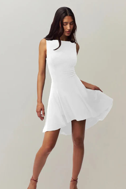 White satin finish mini dress by Lumina Wear, featuring a sleek, fitted design perfect for elegant occasions.