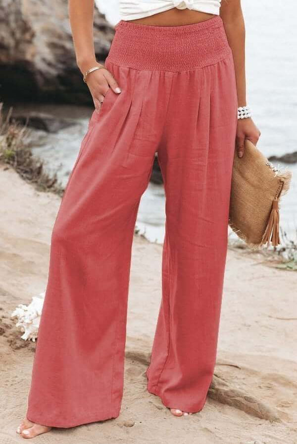 White breathable wide-leg trousers with elastic waist from Lumina Wear, styled on a model, in XS size.