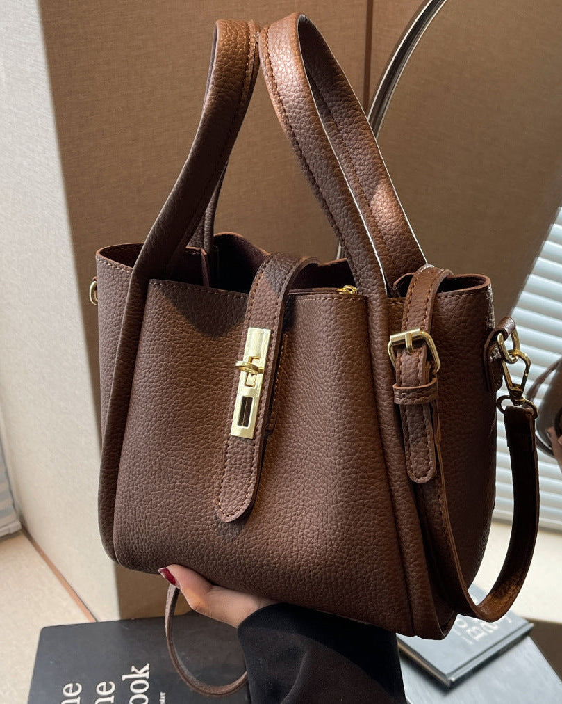 Serena Lumina coffee brown retro crossbody handbag with versatile design, featuring sleek style and adjustable strap.