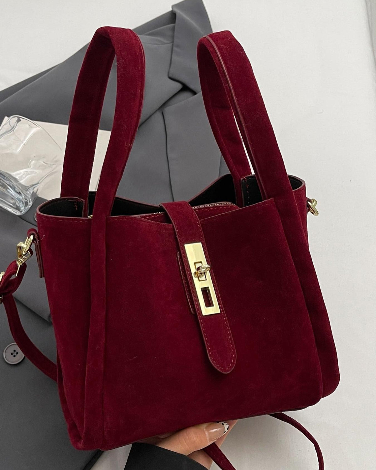 Coffee brown Serena Lumina crossbody handbag featuring a chic retro design and versatile style.