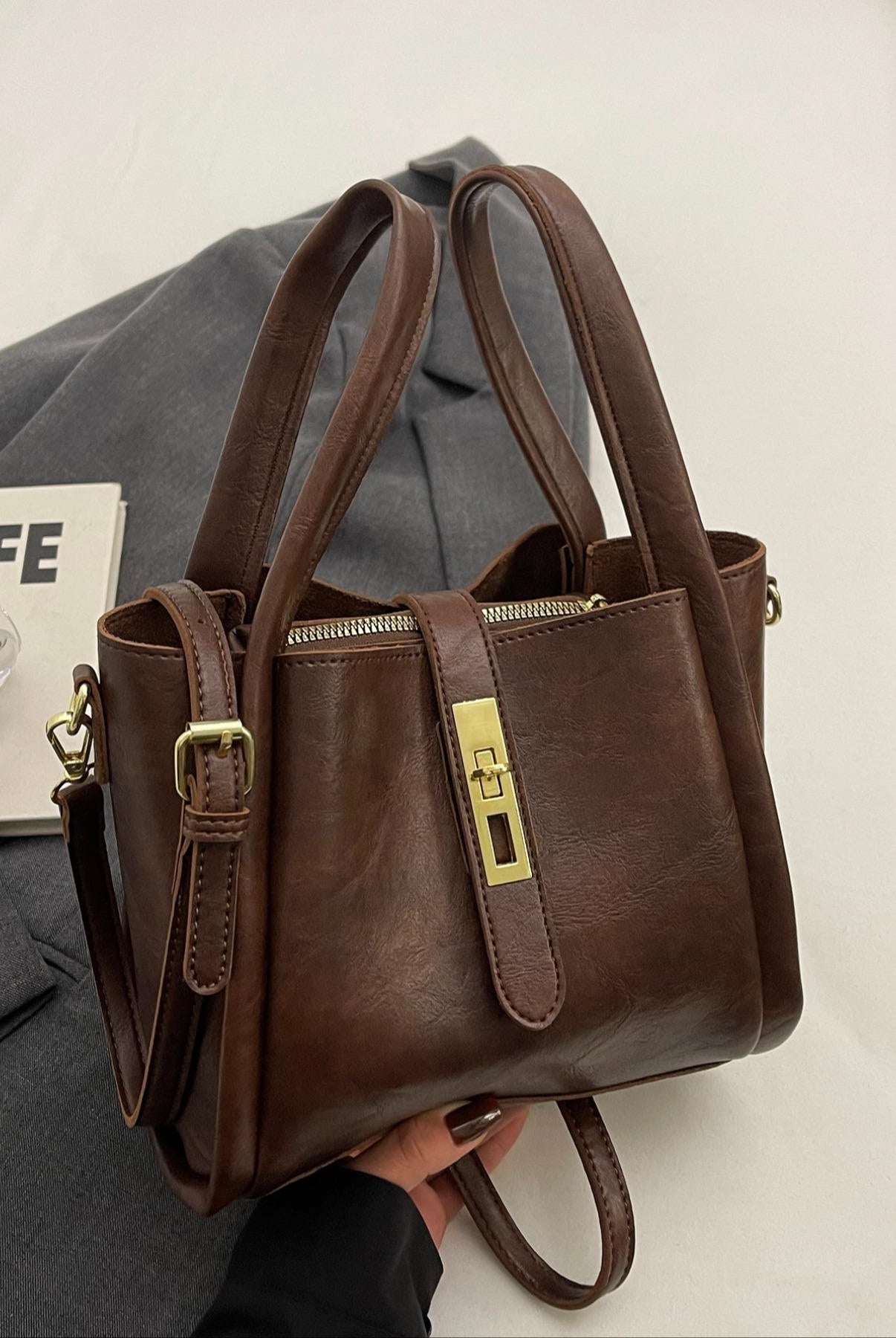 Lumina Wear Serena chic retro crossbody handbag in coffee brown with versatile design, stylish for everyday use.