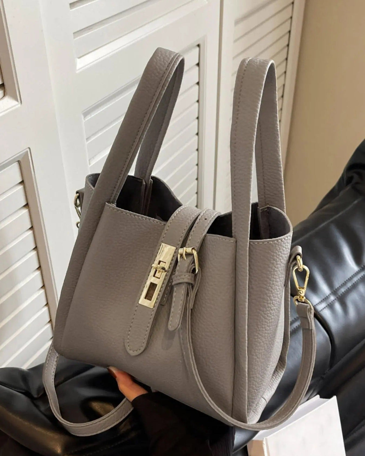 Coffee brown Lumina Wear Serena chic retro crossbody handbag with versatile design, featuring stylish details and compact shape.