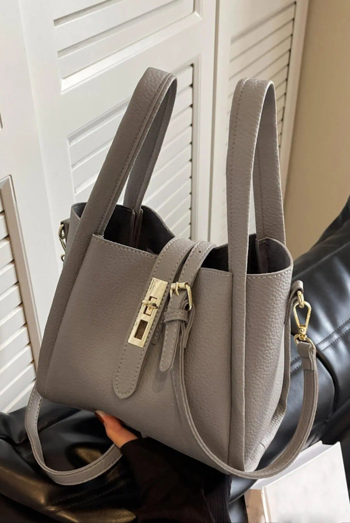Coffee brown Lumina Wear Serena chic retro crossbody handbag with versatile design, featuring stylish accents and adjustable strap.