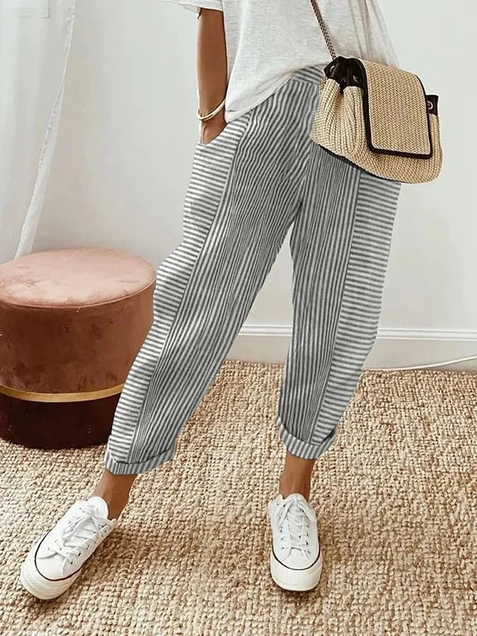 Blue Serena high waist striped trousers with pockets by Lumina Wear, showcasing a stylish and comfortable fit.