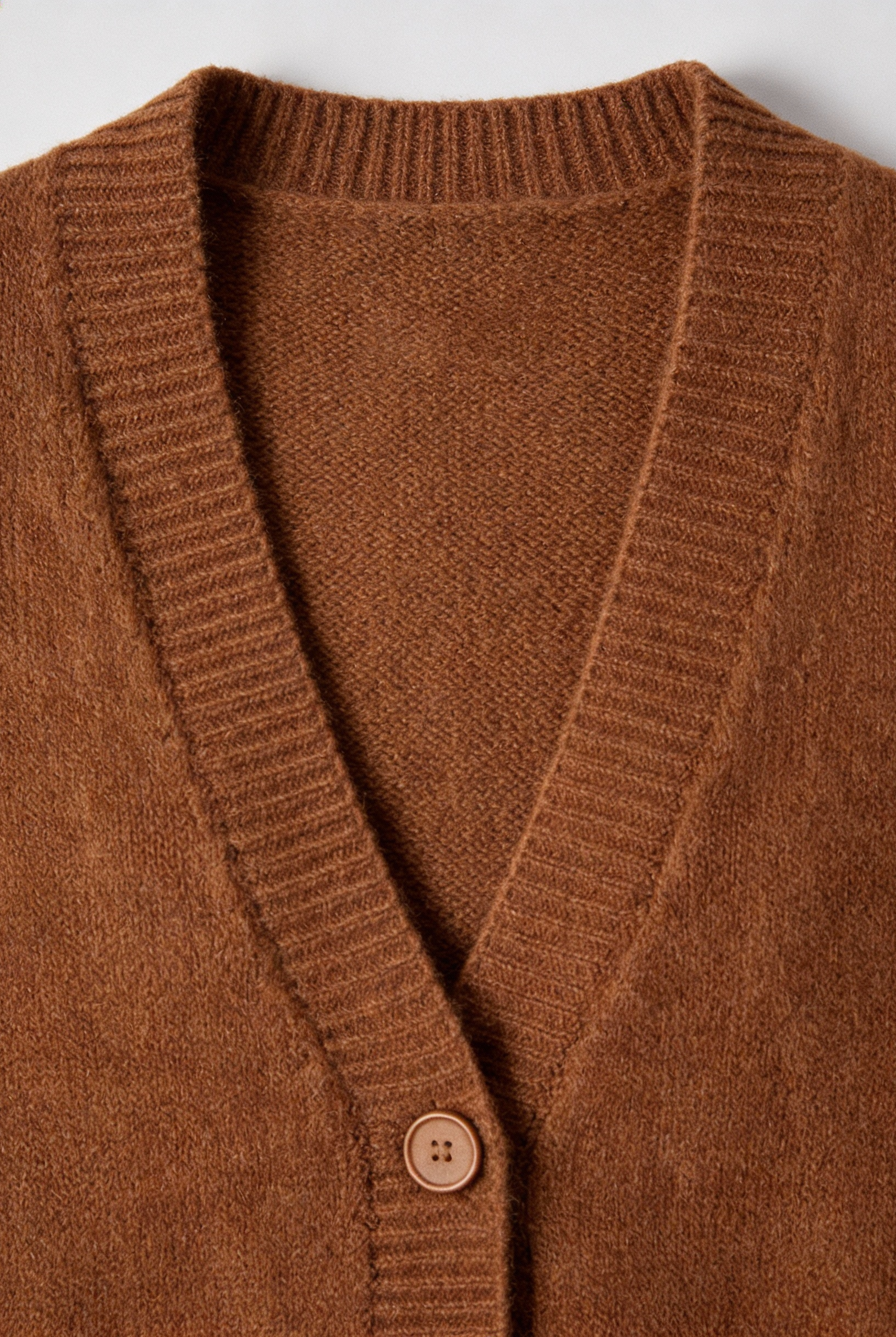 Lumina Wear Serena cozy brown knit cardigan for women with relaxed fit, featuring soft textured fabric and casual style.
