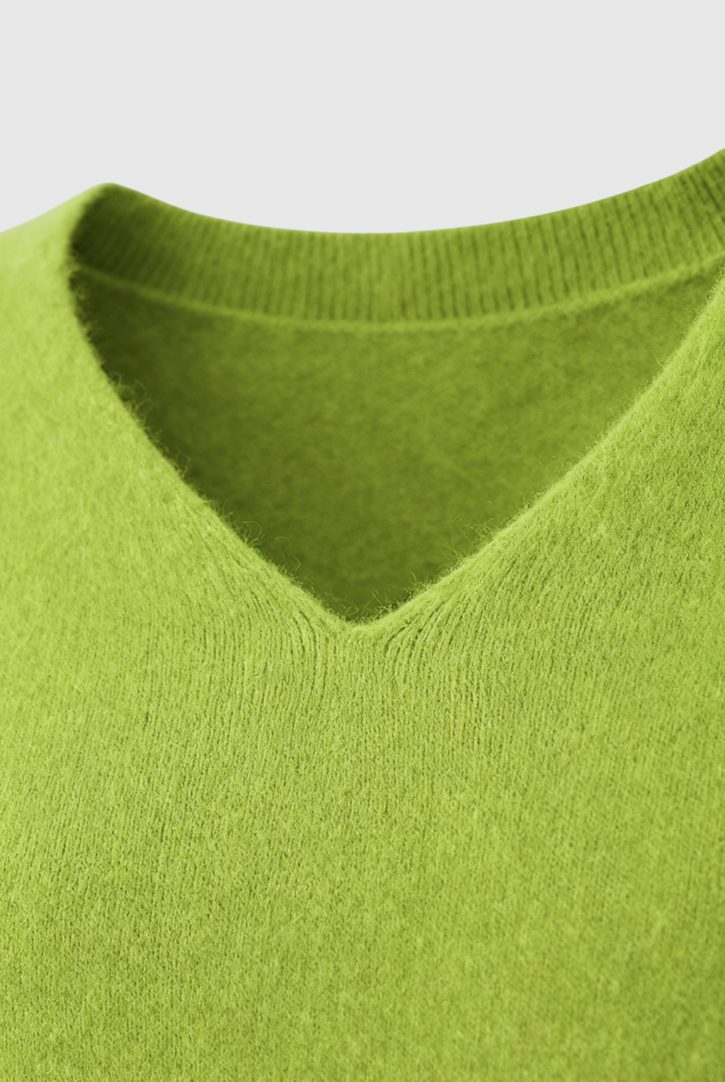 Light green Lumina Wear Serena V-neck women's sweater with a cozy fit, featuring a flattering silhouette and soft knit texture.